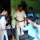 Forensic experts at the house of one of complainants in Kangan Heri.